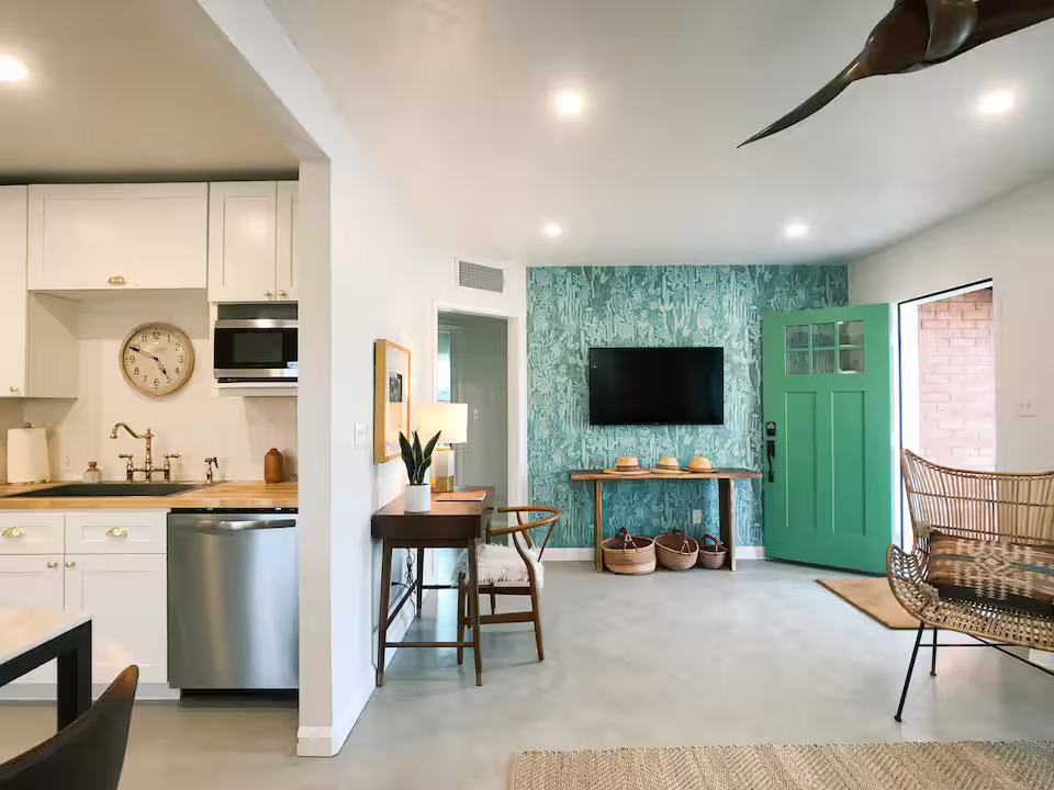 1402 E Roger Road!